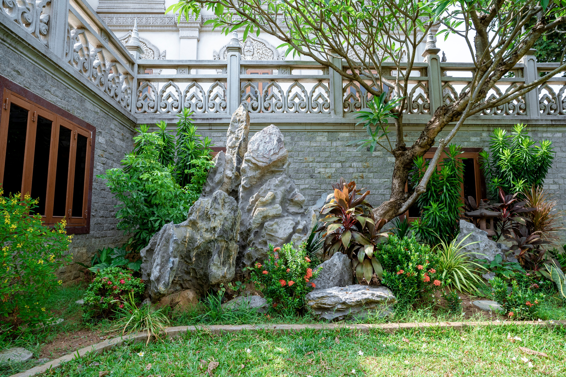 Garden Landscape Near Gray Concrete House